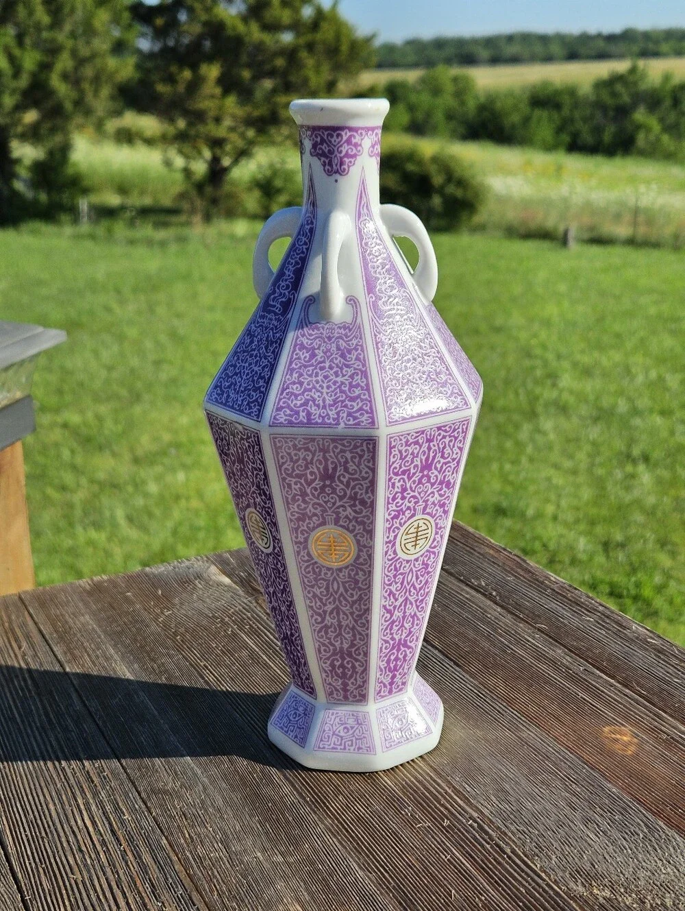 Chinese porcelain vase with purple and white floral and geometric patterns with